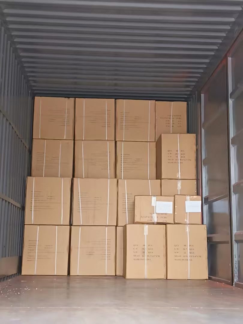 Export cartons stacked inside a shipping container