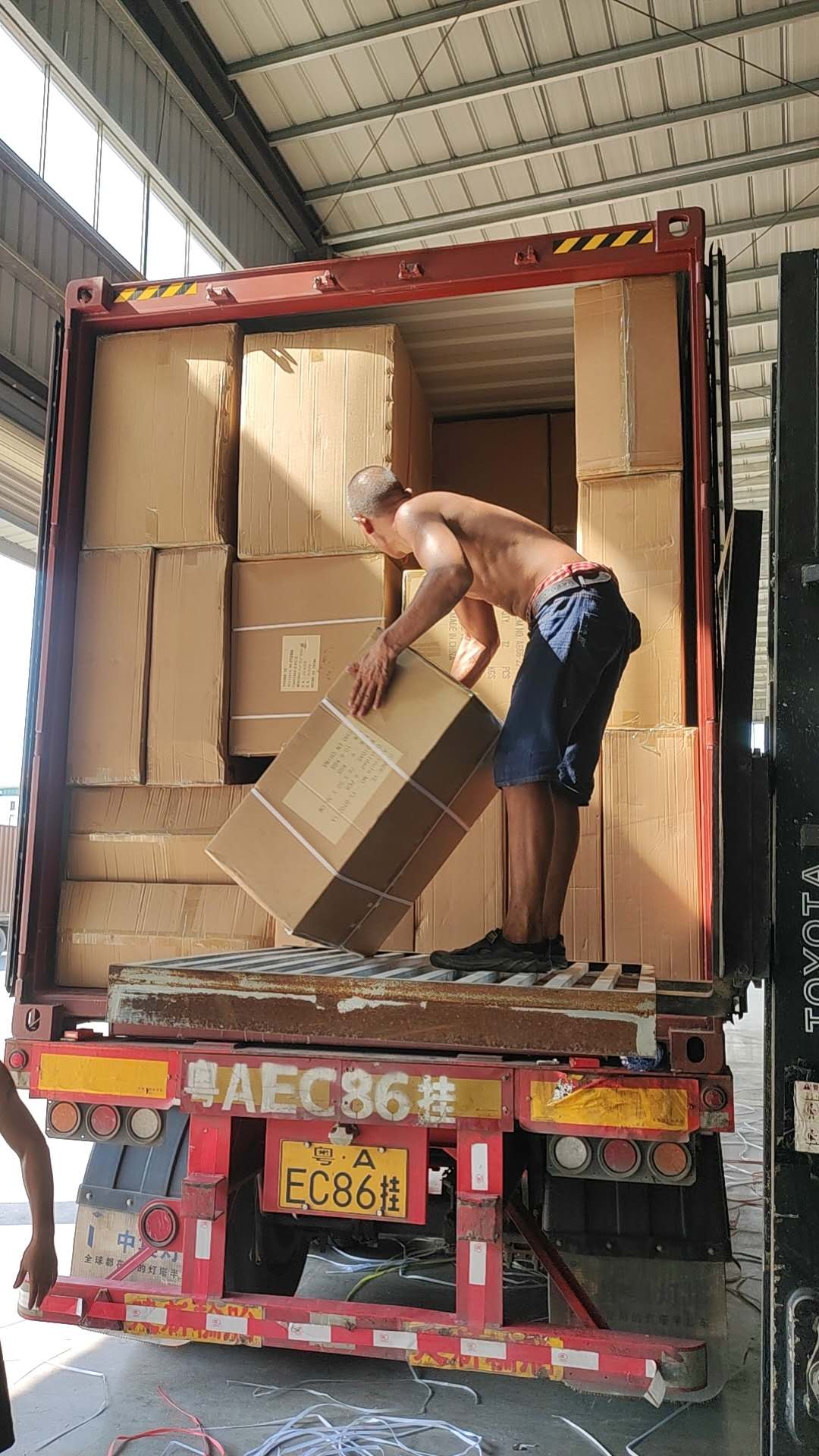 Export cartons being loaded into a container in Guangdong